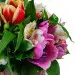 Букет-композиция из микса сезонных цветов (15 штук), экзотической зелени и декоративной упаковки с доставкой.