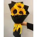 Букет цветов из оранжевых подсолнухов (3 штуки, экстра класс) с доставкой по Киеву.